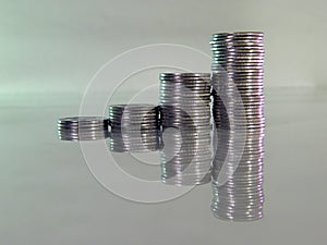 Pile folded of coins in the form of charts