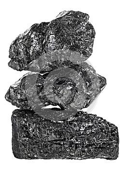 Pile of fractured black coal isolated on white background