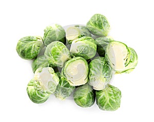 Pile of fresh Brussels sprouts isolated on white, top view