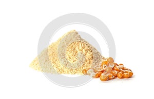 Pile of fresh flour and corn seeds on white
