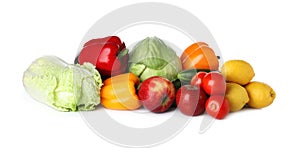 Pile of fresh fruits and vegetables on white