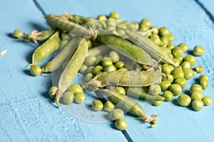 Pile of fresh green peas closeup macro view above