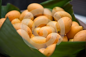 Pile of fresh mayongchid on banana leaf