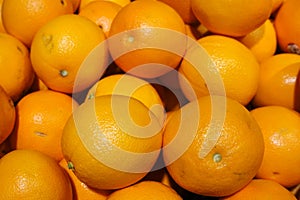 orange oranges in  supermarket