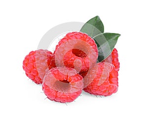 Pile of fresh raspberry with green leaf isolated on white