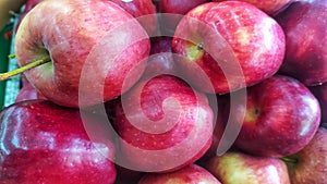 A pile of fresh red apple sold in the traditional market