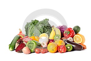 Pile of fresh vegetables and fruits isolated on white