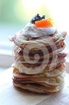 Pile of fritters at a window