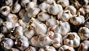 A pile of garlic cloves on a table