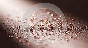 Glitter sparkles on surface closeup