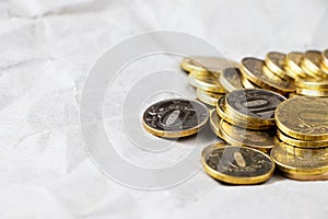 A pile of gold coins isolated on a white background. Treasure hunt. Scattered coins on the white background.