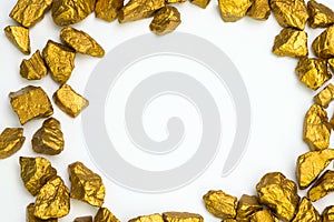 A pile of gold nuggets or gold ore on white background, precious