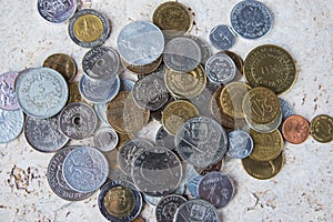 Pile of gold and silber coins on the natural background