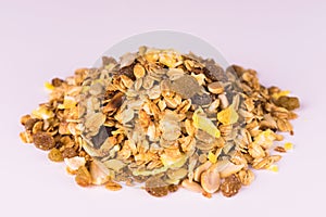 A pile of granola on a white background. Useful food.