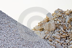 Pile of gravel, stones and cliffs of different sizes