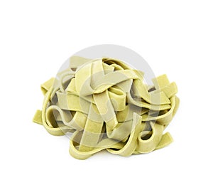 Pile of green fettucce pasta isolated