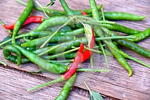 Pile of green and red peppers