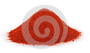 Pile of ground paprika on white