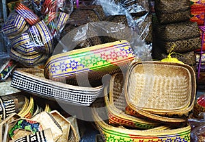 Pile of handcrafted baskets for sale at a market in Bali