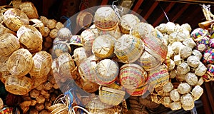 A pile of handmade traditional woven baskets, Ecuador