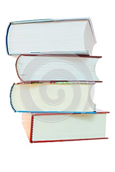 Pile of hardcover books on white background with clipping path