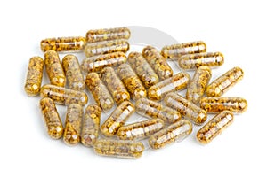 Pile of homeopathic pills with bee pollen photo