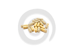 Pile of horny goat weed extract in easy to swallow capsules isolated on white background