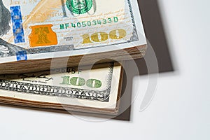 A pile of hundred Money stack US dollar USD, Pay, exchange and looking at numbers 100 for business bills investment concept Close