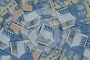 Pile of Indonesian 50000 rupiah banknotes series