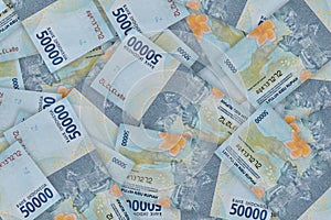 Pile of Indonesian 50000 rupiah banknotes series