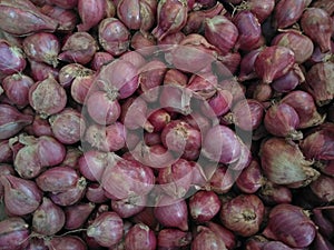 Pile of Indonesian fresh local shallots at Kediri market, East Java. taken from above