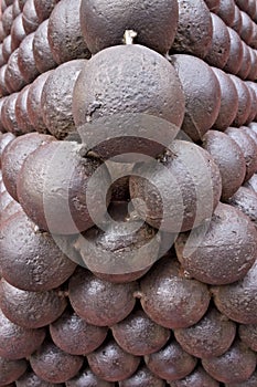 A pile of iron cannon balls.