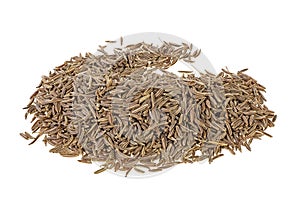 Pile of jeera seeds isolated on white background. Dried cumin seeds. Caraway