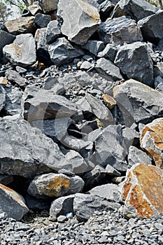 pile of large granite rocks railroad ballast