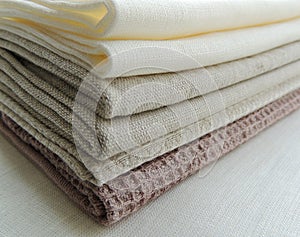 Pile of linen fabrics towels.