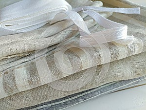 Pile of linen fabrics towels.