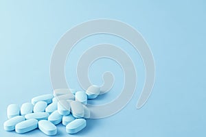 Pile of little oval blue pills