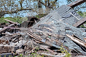 Pile of lumber used to be a strong old barn