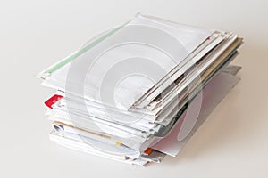 Pile of mails on white background