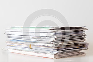 Pile of mails on white background