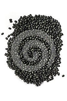 A pile of many dried black beans