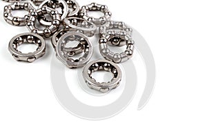 A pile of Many Hub - Wheel ball bearing ring.