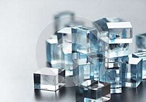 A pile of many little glass cubes