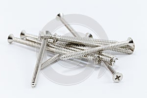 Pile of many silver screws