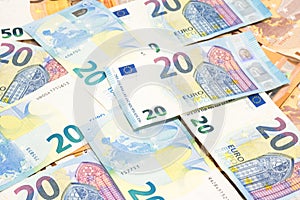 Pile of many twenty euro banknotes use for money or currency background.
