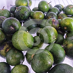 A pile of matoa fruit sold by traders in the market