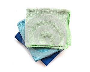 Pile of microfiber cloth for clean on white background, workhouse concept
