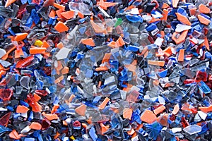 A pile of microplastics - small pieces of hard plastic, intended for further processing.