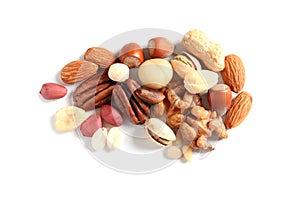 Pile of mixed organic nuts on white