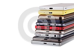Pile of mobile phone. Heap of the different smartphones photo